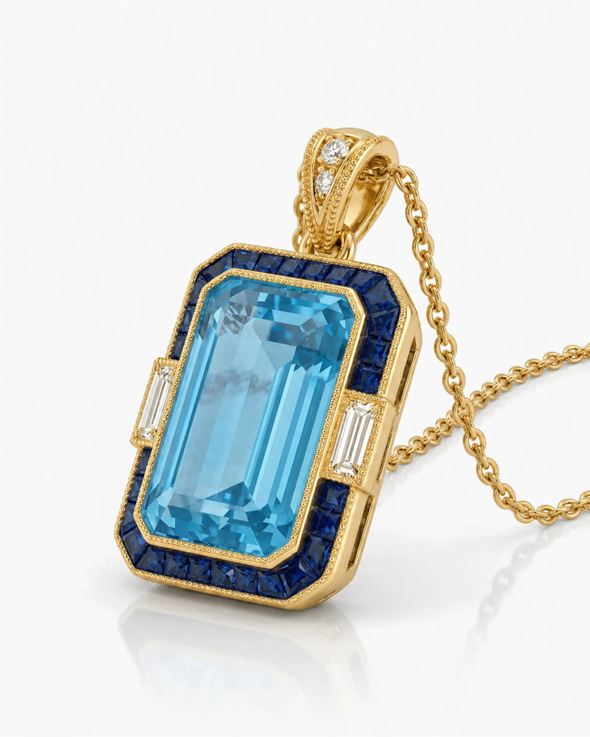 Bleu Meridian emerald-cut Aquamarine sapphire necklace setting in yellow gold, angled view with baguette diamond side accents | SARATTI