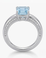 Céleste Arc emerald cut Aquamarine ring setting in white gold, top view showing recessed diamond shoulders | SARATTI