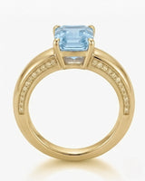 Céleste Arc emerald cut Aquamarine ring setting in yellow gold, top view showing recessed diamond shoulders | SARATTI