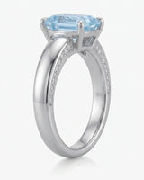 Céleste Arc emerald cut Aquamarine four-prong ring setting in Platinum, front view | SARATTI