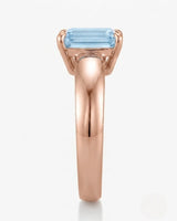 Céleste Arc emerald cut Aquamarine ring setting in rose gold, side profile with open basket | SARATTI