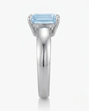 Céleste Arc emerald cut Aquamarine ring setting in white gold, side profile with open basket | SARATTI
