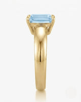Céleste Arc emerald cut Aquamarine ring setting in yellow gold, side profile with open basket | SARATTI
