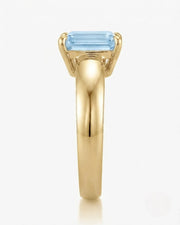Céleste Arc emerald cut Aquamarine ring setting in yellow gold, side profile with open basket | SARATTI