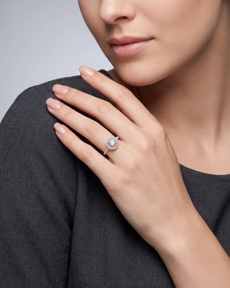 Chelsea 0.5 carat round natural diamond engagement ring with natural pink diamond double halo in 18K white gold, worn on hand | SARATTI
