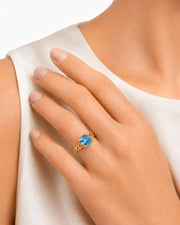 Cordelle Asscher-cut Aquamarine sculptural rope-band solitaire ring setting in Yellow Gold, front view | SARATTI