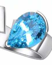 Courant pear-cut Aquamarine sculptural open-band solitaire ring setting in Platinum, side view | SARATTI