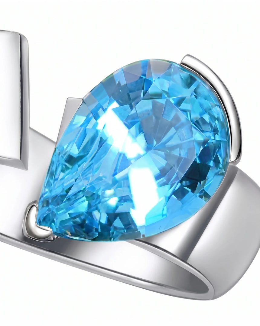 Courant pear-cut Aquamarine sculptural open-band solitaire ring setting in Platinum, side view | SARATTI