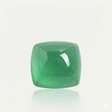 Green gemstone on a light gray background - 1.72 carats Natural Muzo Green Emerald | Sugarloaf Cabochon – 7.37 × 7.33 × 4.19mm
