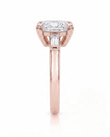 Diane 1 carat F-colour princess natural diamond three-stone ring in 18K rose gold, side profile showing raised open three-stone gallery | SARATTI