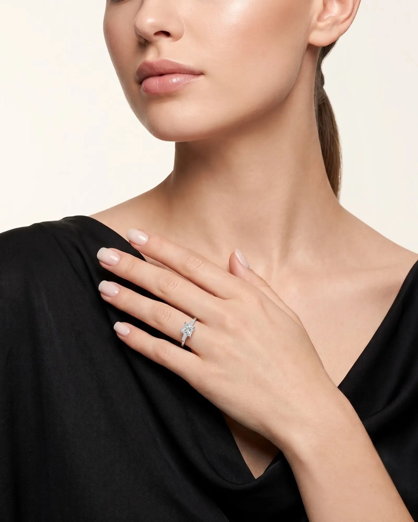 Diane 1 carat F-colour princess natural diamond three-stone ring in 18K white gold, worn on hand | SARATTI