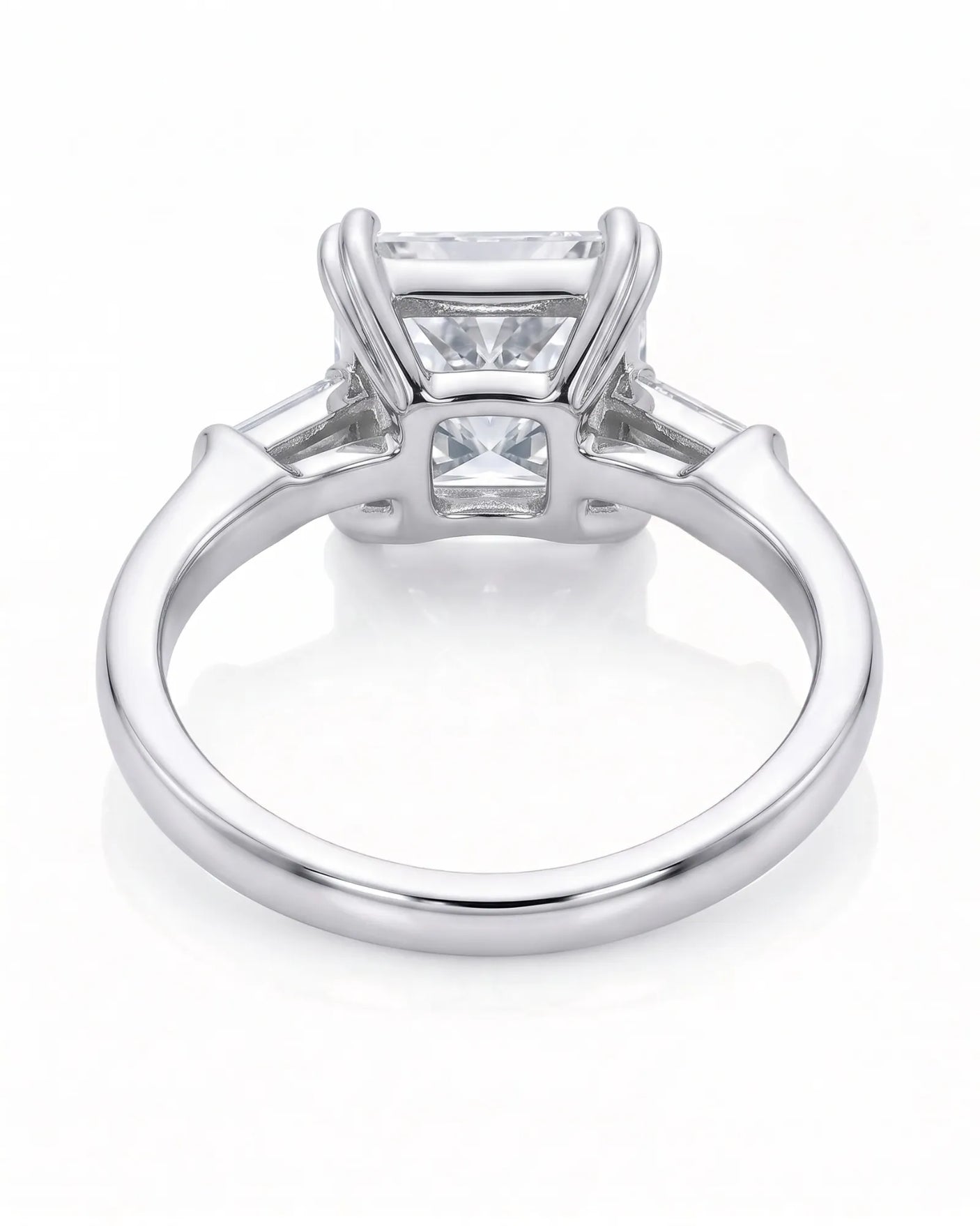 Diane 1 carat F-colour princess natural diamond three-stone ring in 18K white gold, underside view of three-stone setting | SARATTI