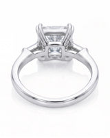 Diane 1 carat F-colour princess natural diamond three-stone ring in 18K white gold, underside view of three-stone setting | SARATTI