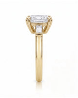 Diane 1 carat F-colour princess natural diamond three-stone ring in 18K yellow gold, side profile showing raised open three-stone gallery | SARATTI