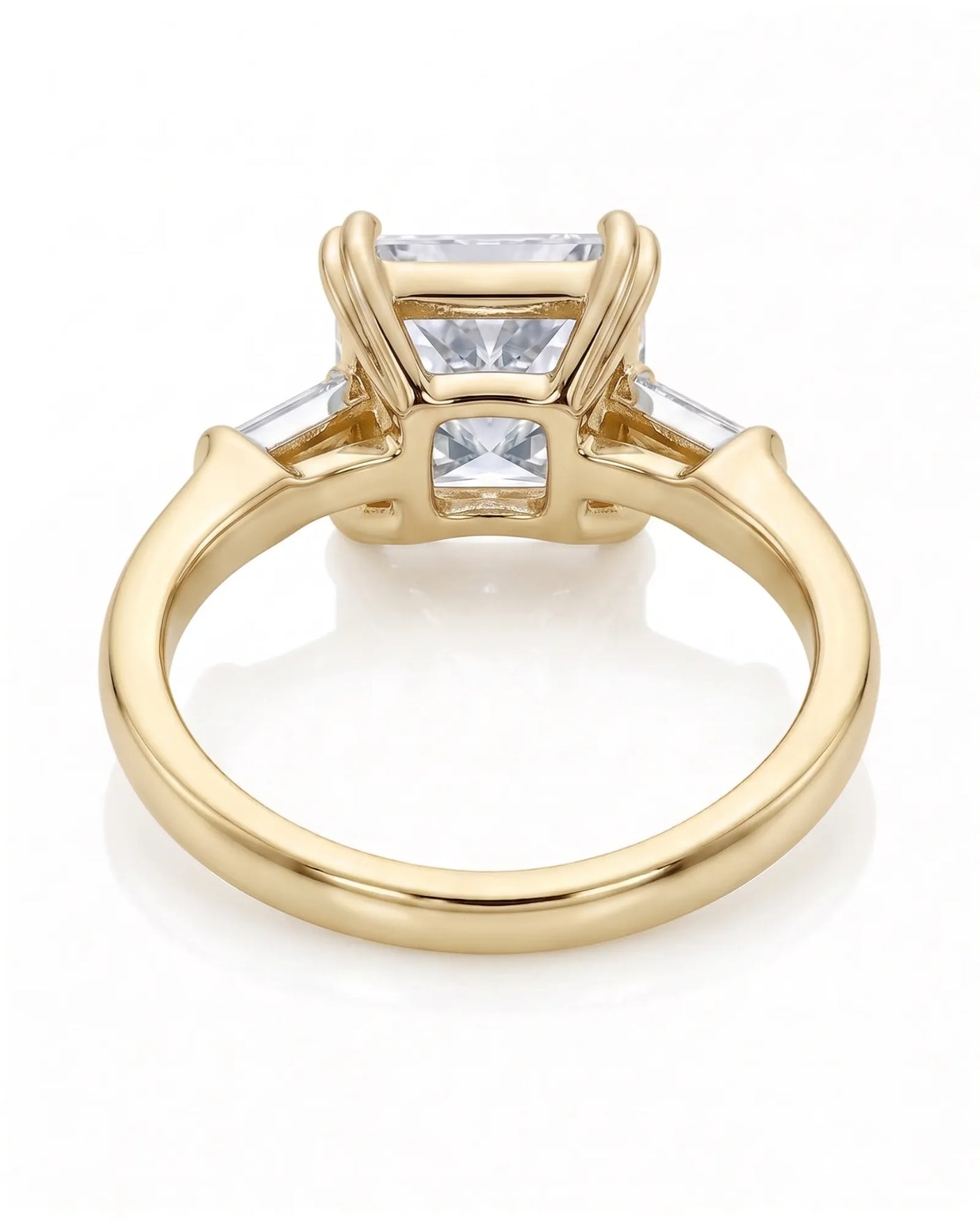Diane 1 carat F-colour princess natural diamond three-stone ring in 18K yellow gold, underside view of three-stone setting | SARATTI