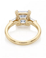 Diane 1 carat F-colour princess natural diamond three-stone ring in 18K yellow gold, underside view of three-stone setting | SARATTI