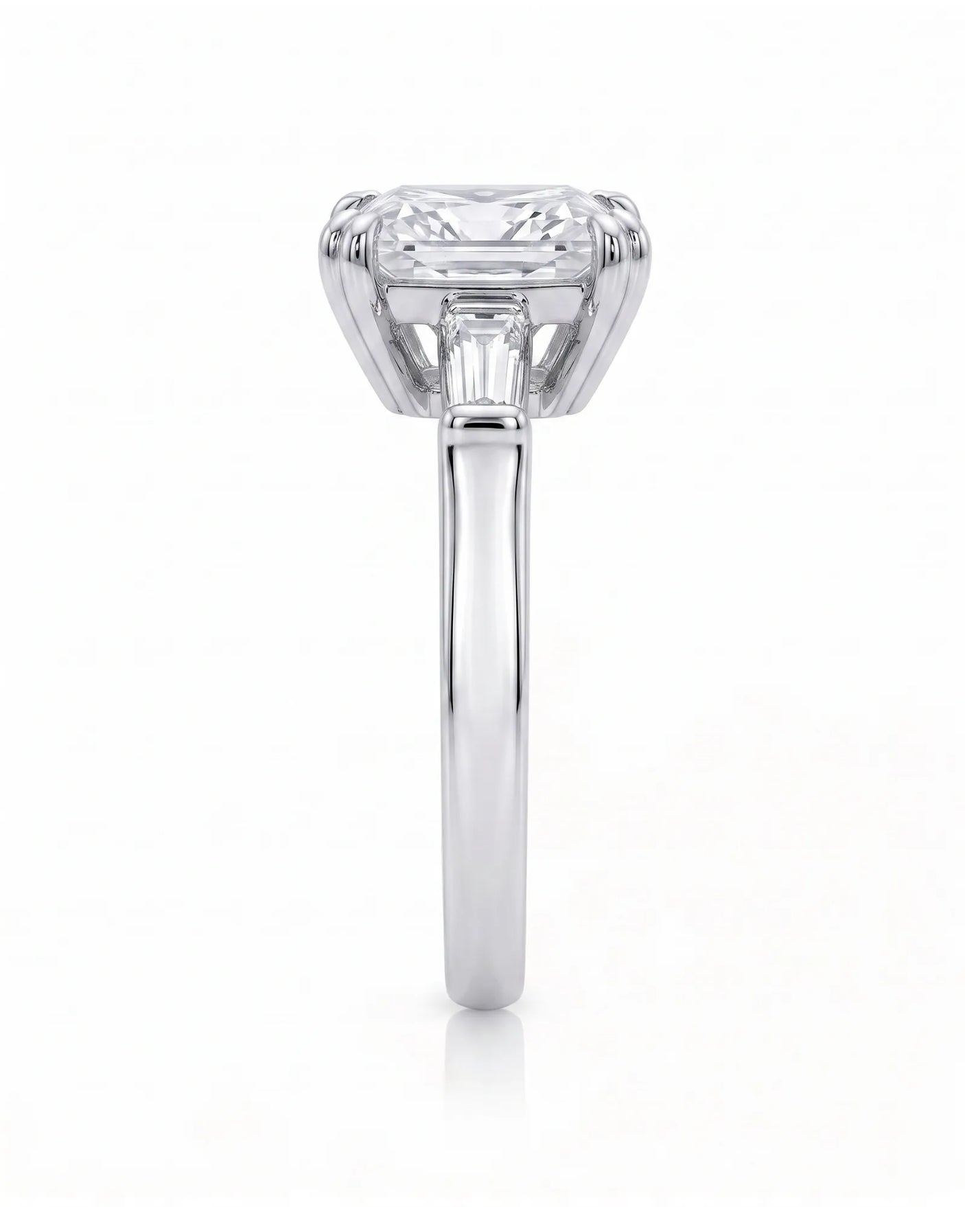 Diane 1 carat F-colour princess natural diamond three-stone ring in platinum, side profile showing raised open three-stone gallery | SARATTI