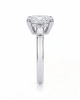 Diane 1 carat F-colour princess natural diamond three-stone ring in platinum, side profile showing raised open three-stone gallery | SARATTI
