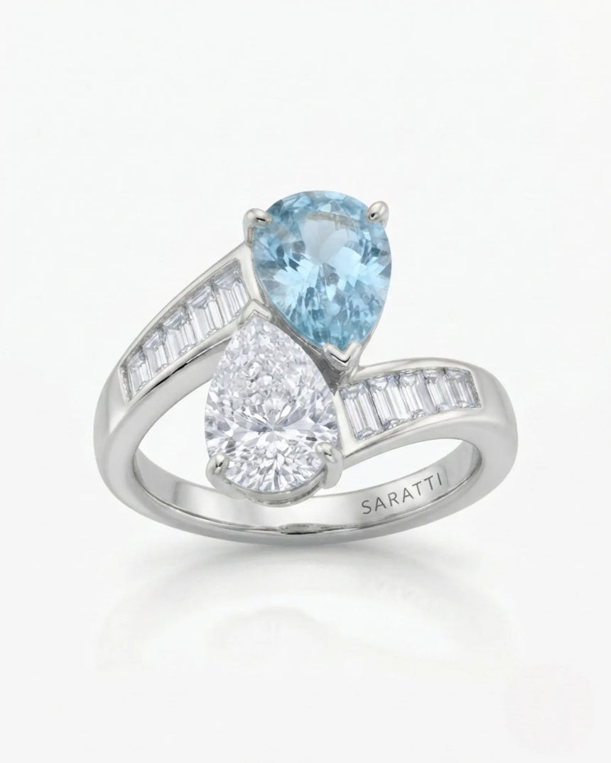 Élan Céleste pear-cut Aquamarine and diamond bypass ring setting in Platinum, top view with tapered baguette shoulders | SARATTI