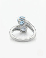 Élan Céleste pear-cut Aquamarine bypass ring setting in Platinum, underside showing curved crossover band and open gallery | SARATTI