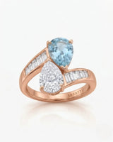 Élan Céleste pear-cut Aquamarine and diamond bypass ring setting in rose gold, top view with tapered baguette shoulders | SARATTI