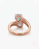 Élan Céleste pear-cut Aquamarine bypass ring setting in rose gold, underside showing curved crossover band and open gallery | SARATTI