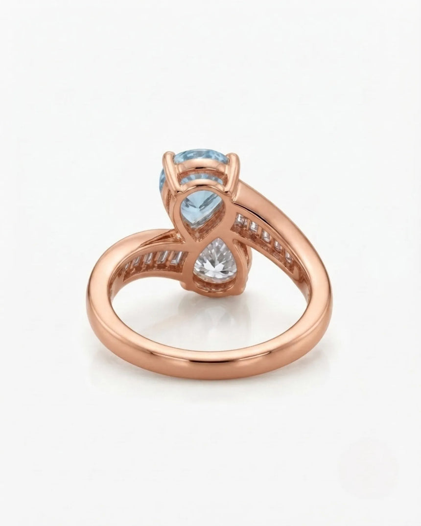 Élan Céleste pear-cut Aquamarine bypass ring setting in rose gold, underside showing curved crossover band and open gallery | SARATTI