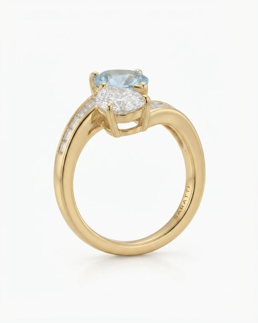 Élan Céleste pear-cut Aquamarine bypass ring setting in yellow gold, side profile showing separate open baskets | SARATTI