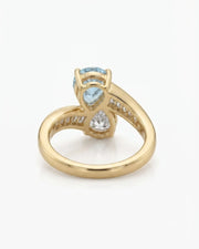 Élan Céleste pear-cut Aquamarine bypass ring setting in yellow gold, underside showing curved crossover band and open gallery | SARATTI