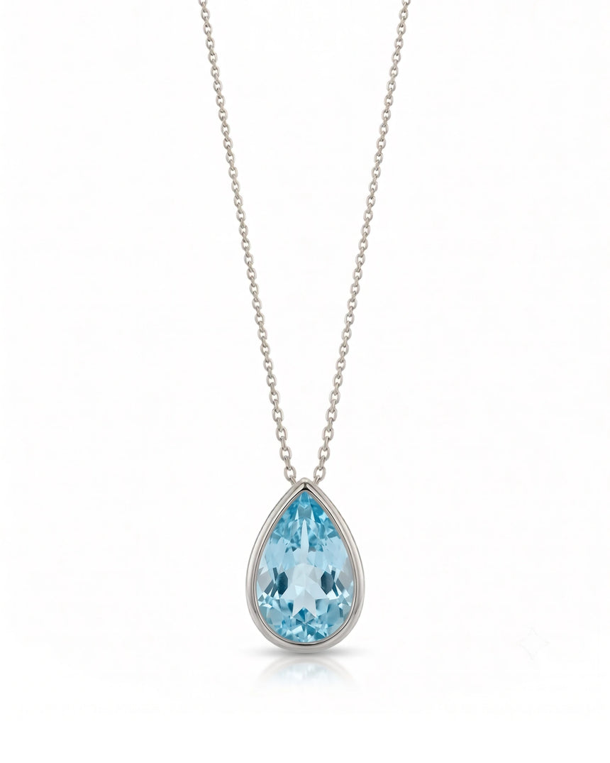 ELLORA pear-cut Aquamarine bezel pendant necklace in White Gold, front view | SARATTI