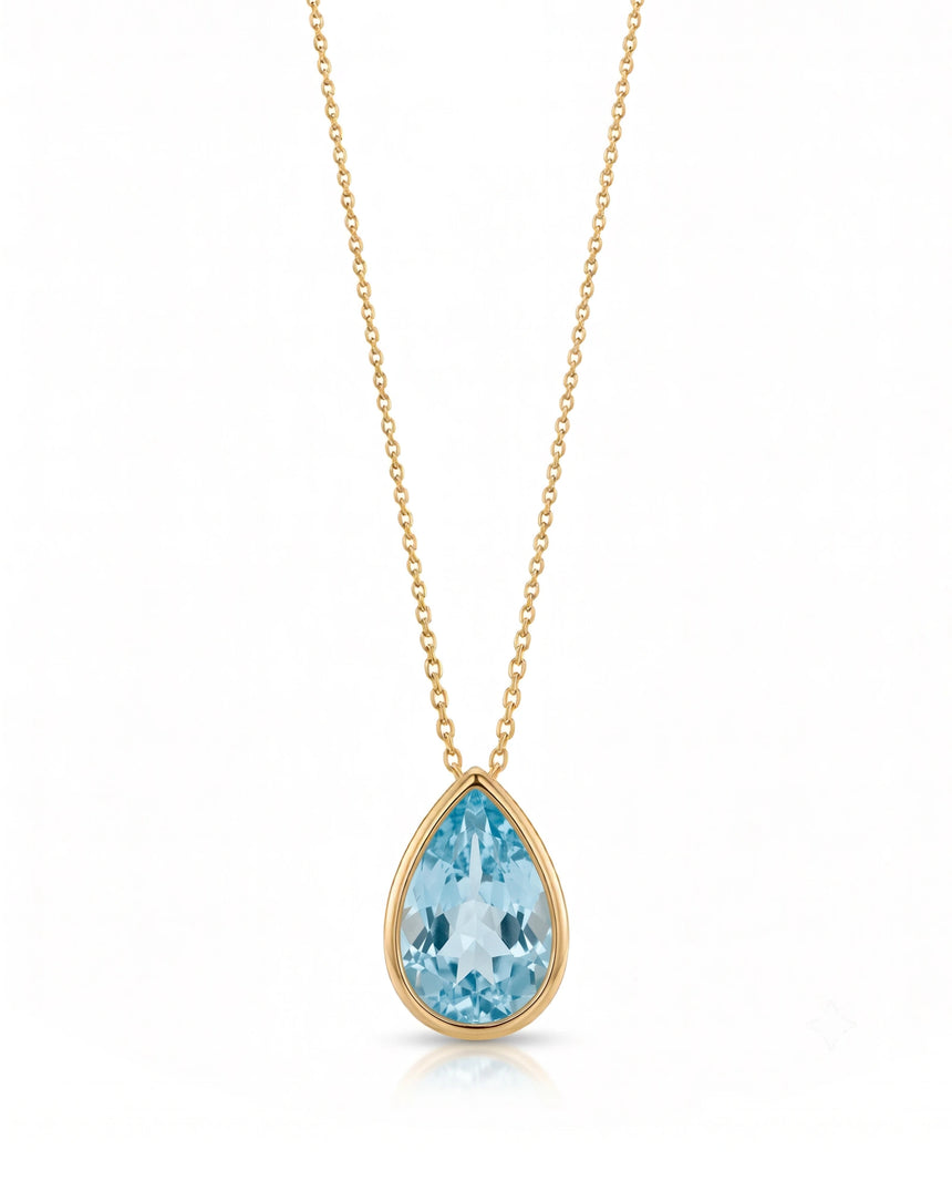 ELLORA pear-cut Aquamarine bezel pendant necklace in Yellow Gold, front view | SARATTI