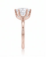 Estelle 1 carat F-colour round natural diamond crown solitaire ring in 18K rose gold, side profile showing raised open crown basket | SARATTI
