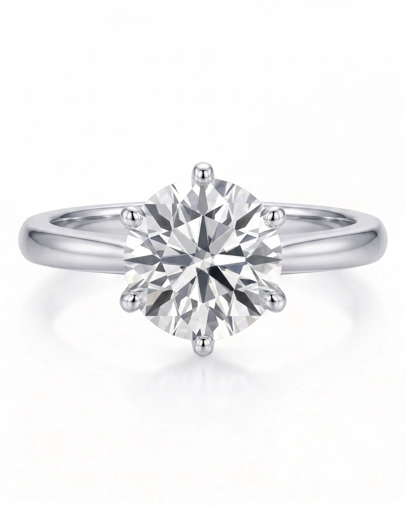 Estelle 1 carat F-colour round natural diamond crown solitaire ring in 18K white gold, front view of sculpted six-prong crown | SARATTI