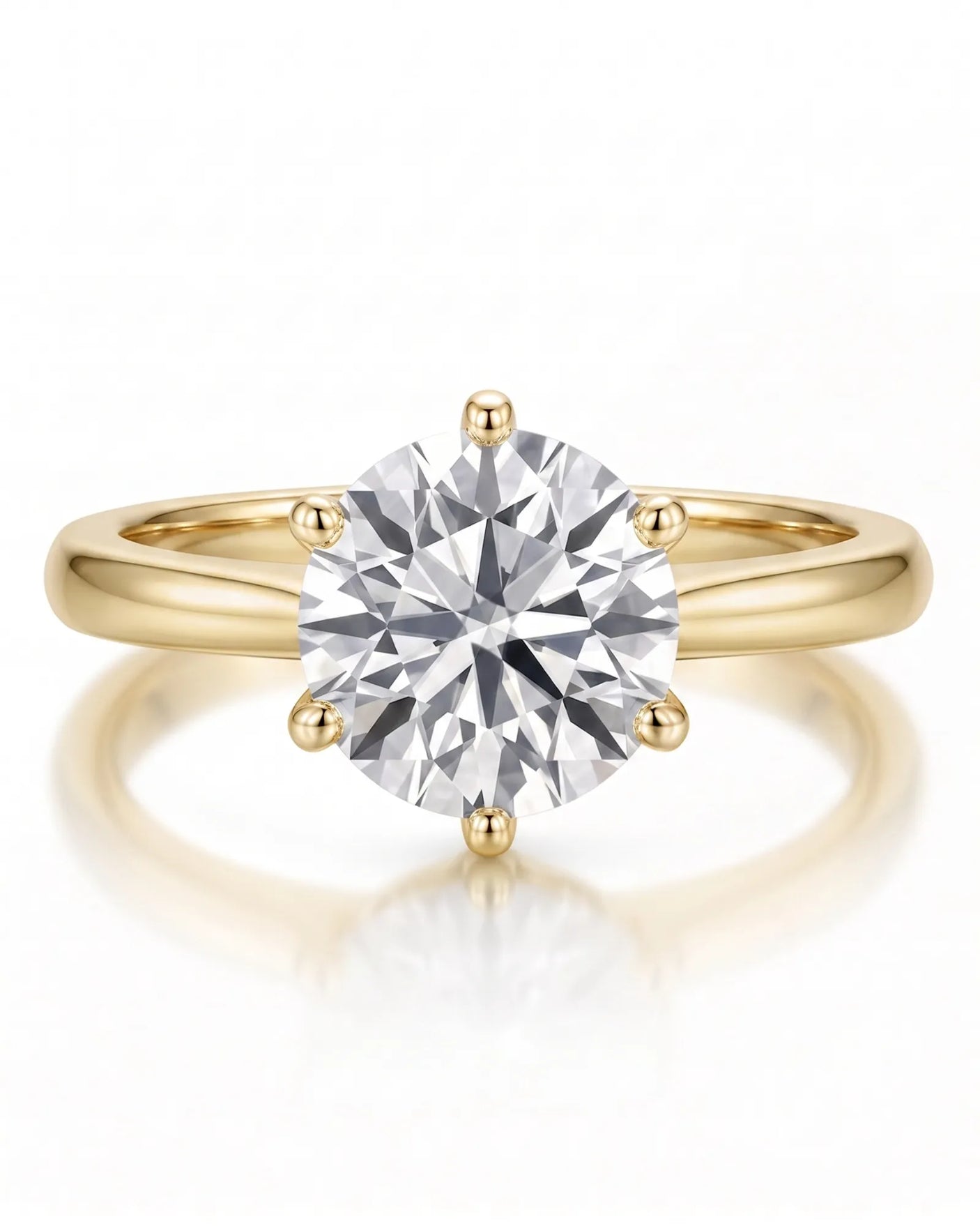 Estelle 1 carat F-colour round natural diamond crown solitaire ring in 18K yellow gold, front view of sculpted six-prong crown | SARATTI