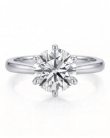 Estelle 1 carat F-colour round natural diamond crown solitaire ring in platinum, front view of sculpted six-prong crown | SARATTI