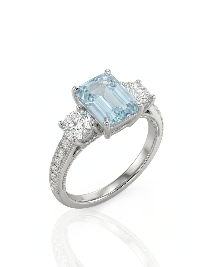 Étoile Trinity emerald cut Aquamarine three-stone diamond ring setting in Platinum, 45-degree view | SARATTI