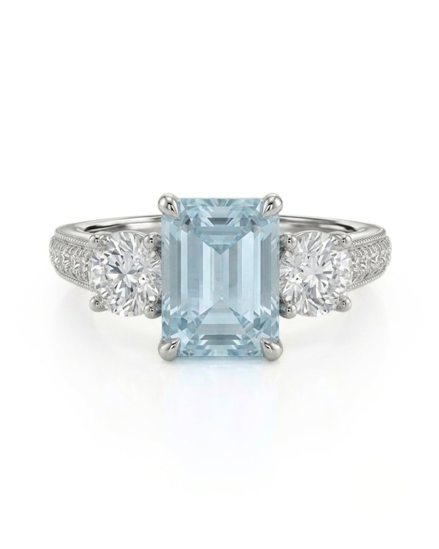 Étoile Trinity emerald cut Aquamarine three-stone diamond ring setting in Platinum, front view | SARATTI