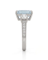 Étoile Trinity emerald cut Aquamarine three-stone diamond ring setting in Platinum, side profile | SARATTI