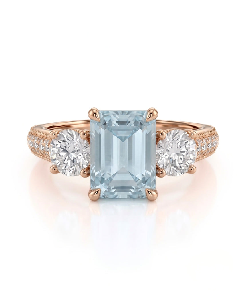 Étoile Trinity emerald cut Aquamarine three-stone diamond ring setting in Rose Gold, front view | SARATTI