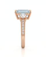 Étoile Trinity emerald cut Aquamarine three-stone diamond ring setting in Rose Gold, side profile | SARATTI