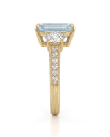 Étoile Trinity emerald cut Aquamarine three-stone diamond ring setting in Yellow Gold, side profile | SARATTI