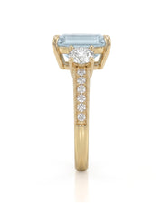 Étoile Trinity emerald cut Aquamarine three-stone diamond ring setting in Yellow Gold, side profile | SARATTI