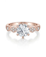 Florence 1 carat round natural diamond engagement ring in 18K rose gold, front view of geometric diamond shoulders | SARATTI