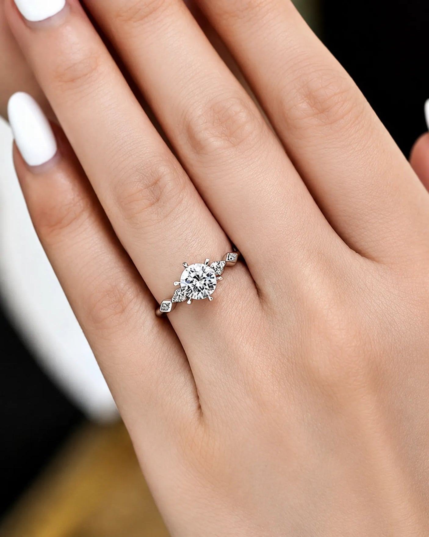 Florence 1 carat round natural diamond geometric engagement ring in platinum, worn on hand | SARATTI