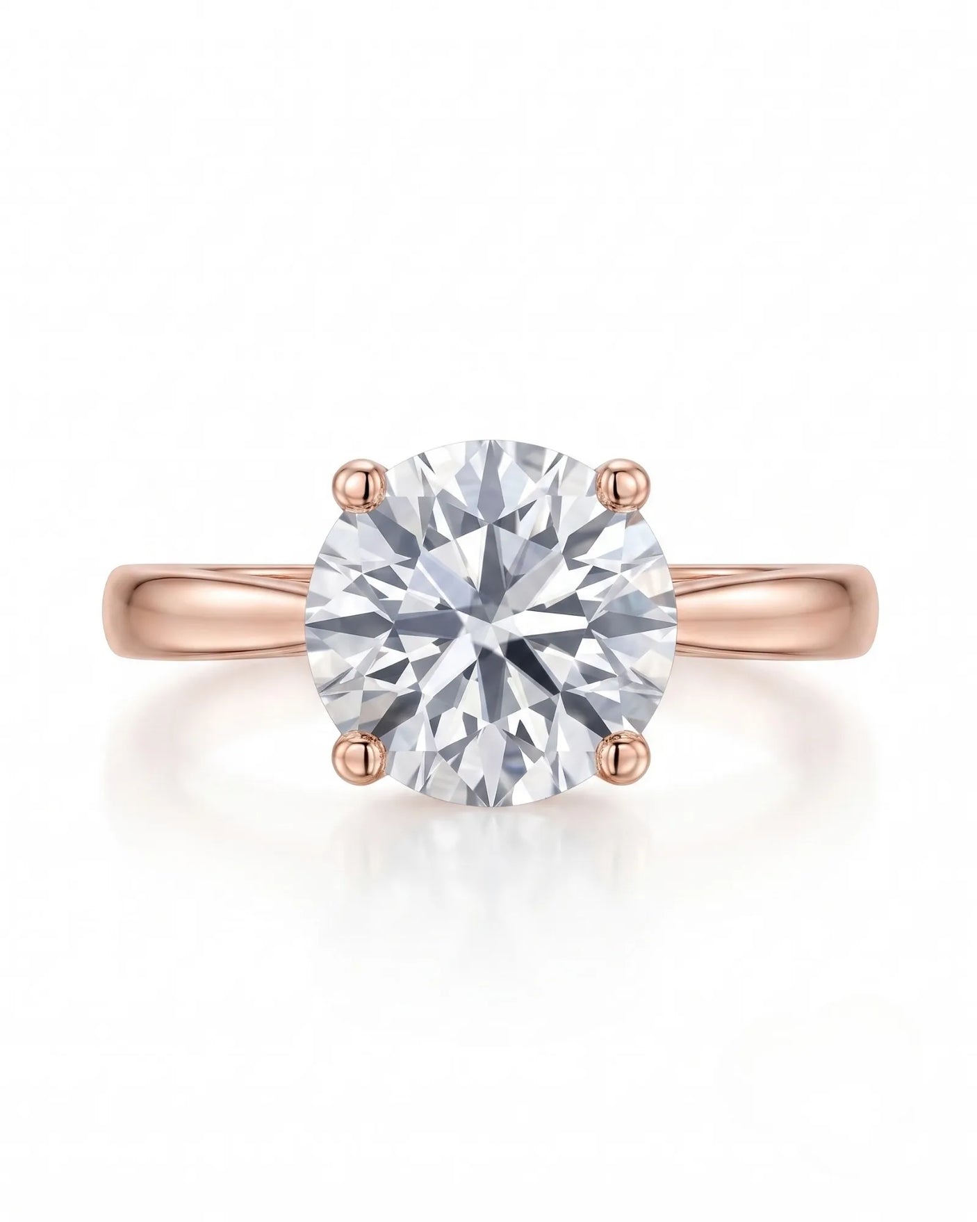 FORIA 1 carat round natural diamond sculpted solitaire ring in 18K rose gold, front view of four-prong centre | SARATTI
