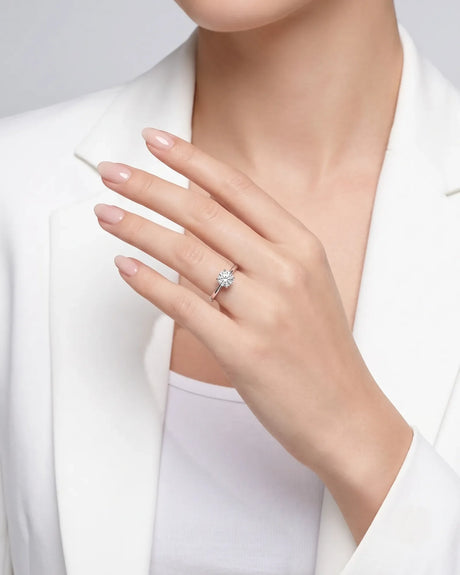 FORIA 1 carat round natural diamond sculpted solitaire ring in 18K white gold, worn on hand | SARATTI