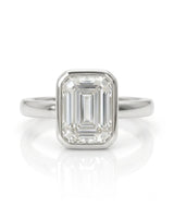 2 carat GIA-certified natural emerald cut diamond bezel ring in white gold front view | SARATTI