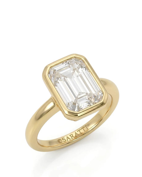 Golden Horizon 2 carat natural emerald cut diamond bezel engagement ring 45-degree view | SARATTI