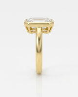 Golden Horizon natural emerald cut diamond bezel engagement ring in yellow gold side profile | SARATTI