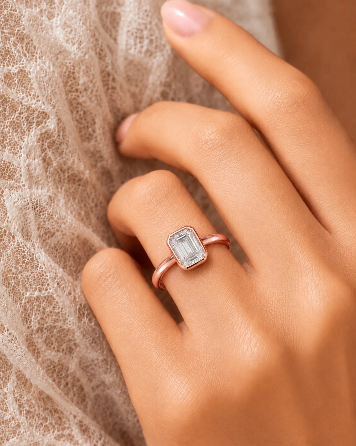 Golden Horizon natural emerald cut diamond bezel engagement ring worn on hand in white gold | SARATTI